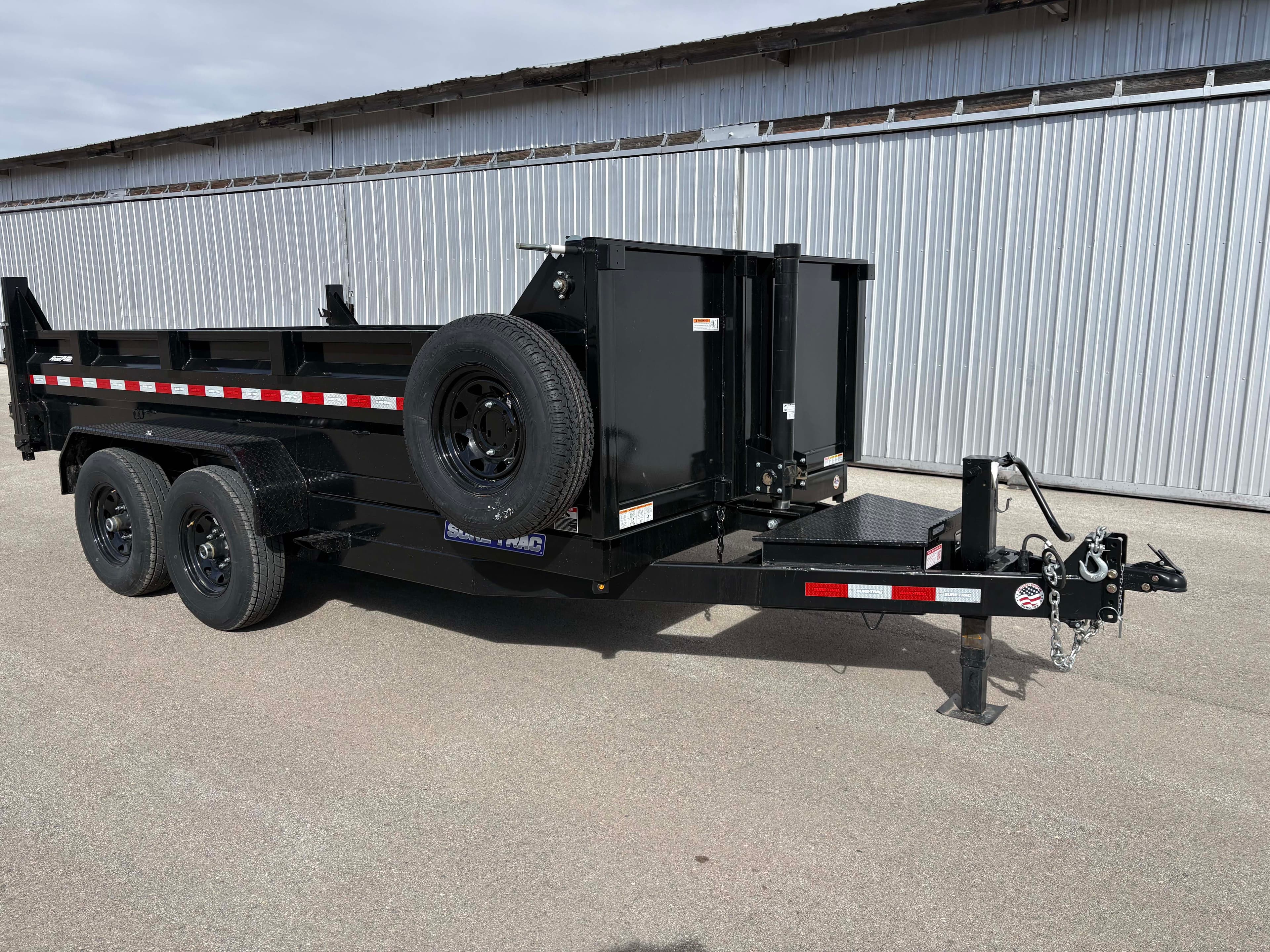 Sure Trac 7X14 Lopro dump trailer with hydraulic lift system for construction and landscaping debris hauling
